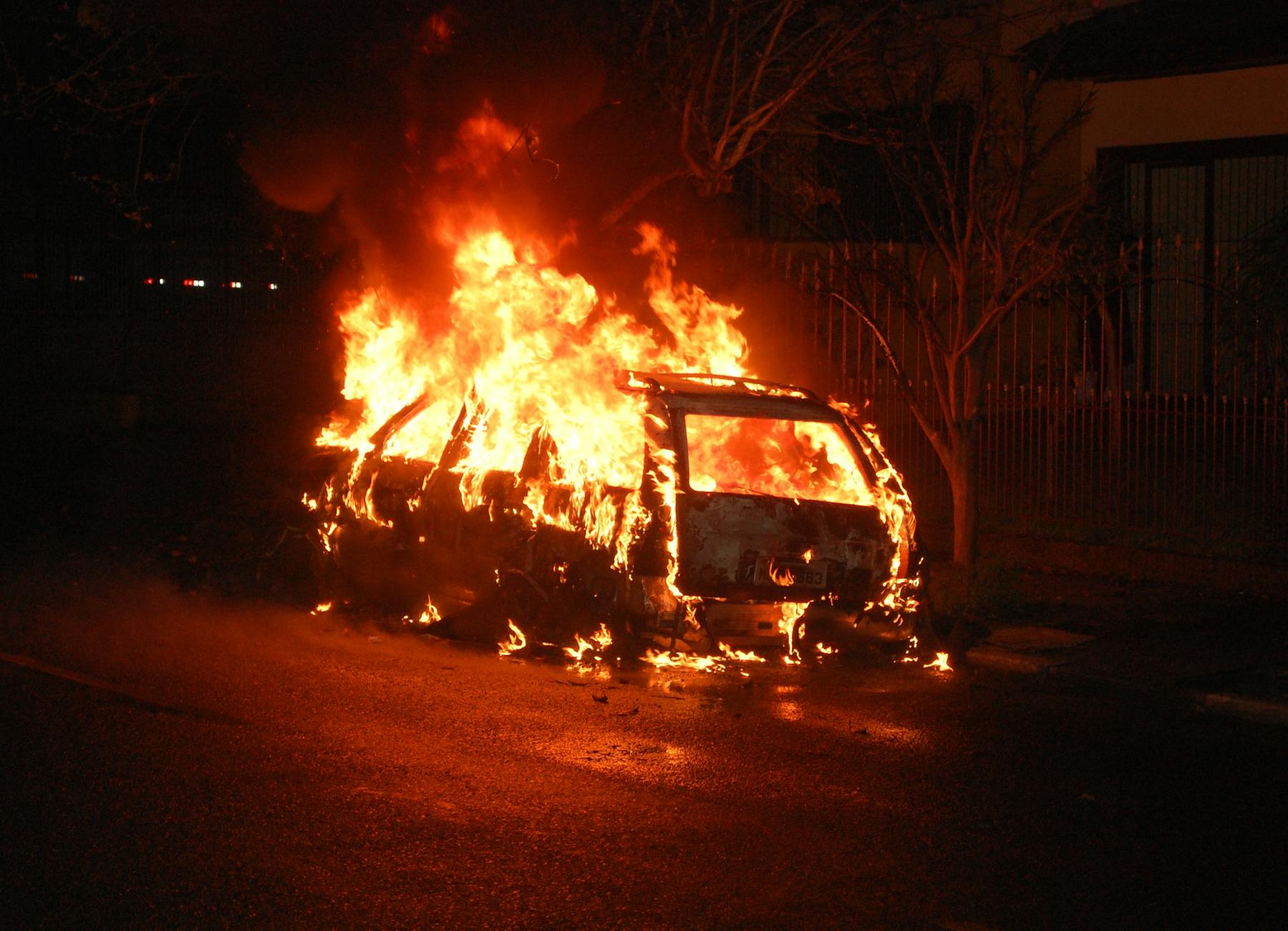 photograph of a burning car