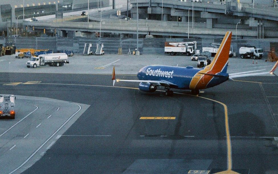 airplane on tarmac at sunrise in new york